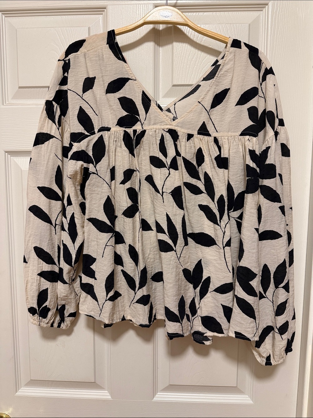 V-Neck Cream Tunic Top with Black Leaf Print